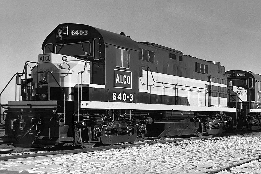 Diesel locomotives lined up in sun