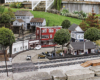 Coal and lumber garden railroad: City scene in garden railway