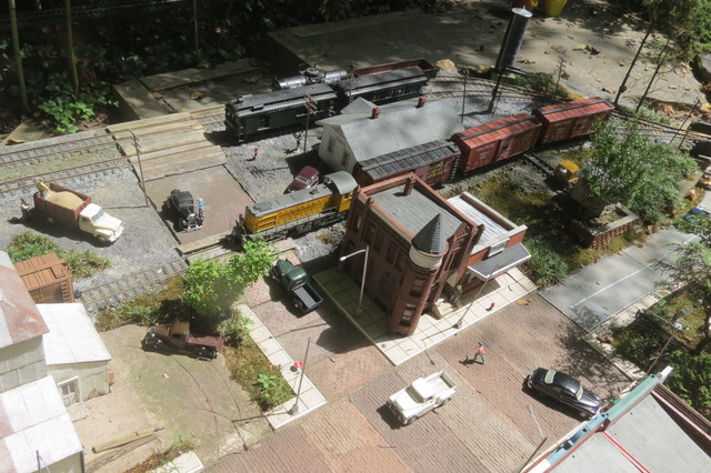 Overview of outdoor model city on garden railroad