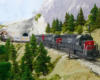 A trio of gray-and-scarlet diesels pull an intermodal train out of a tunnel and onto a track that snakes along a mountainside