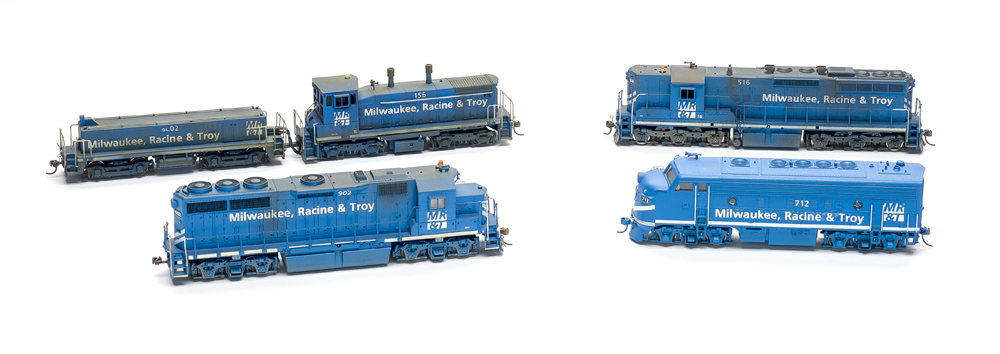 MR&T blue diesel locomotives: Photo of five HO scale diesel locomotives on white background