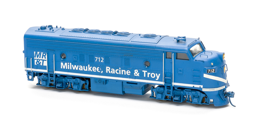 HO scale cab unit painted blue with white graphics.