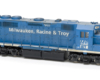 HO scale four-axle road unit painted blue with white graphics.