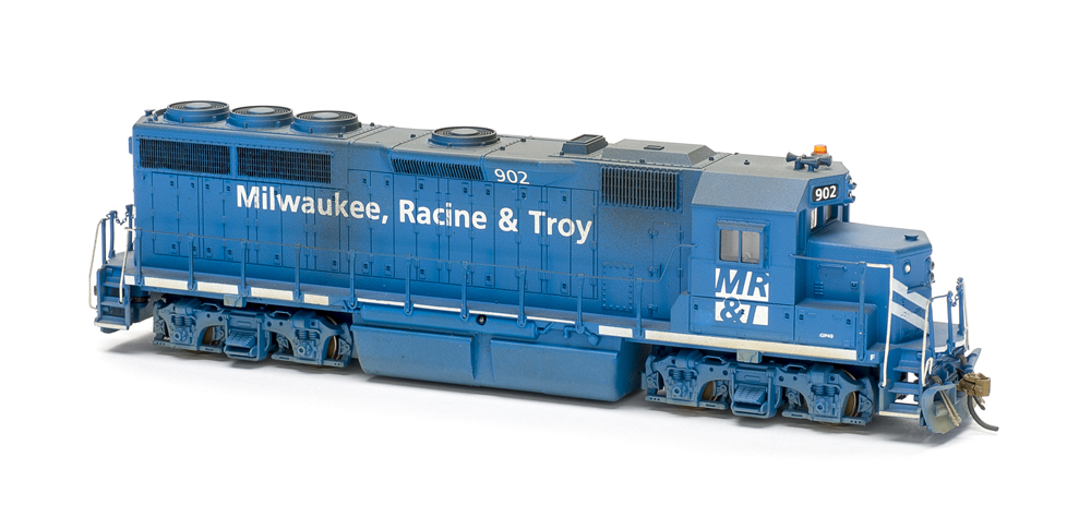 HO scale four-axle road unit painted blue with white graphics.