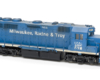 HO scale four-axle road unit painted blue with white graphics.