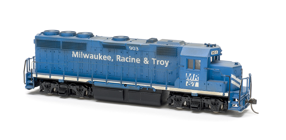 HO scale four-axle road unit painted blue with white graphics.