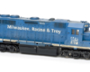 HO scale four-axle road unit painted blue with white graphics.