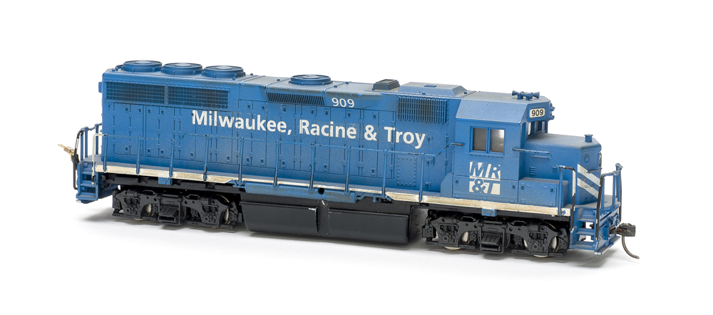 HO scale four-axle road unit painted blue with white graphics.