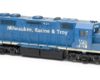 HO scale four-axle road unit painted blue with white graphics.