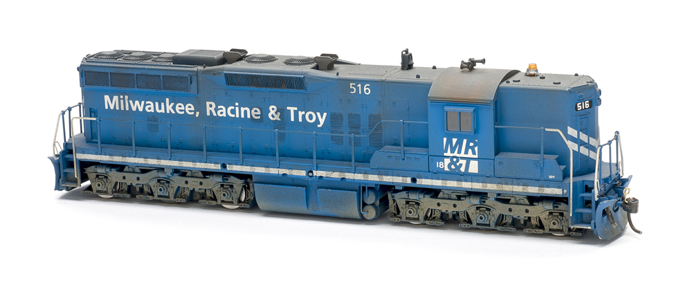 MR&T blue diesel locomotives: High-hood six-axle road unit painted blue with white graphics