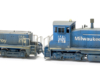 End-cab switcher and slug set painted blue with white graphics.