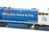 Photo of blue and white road locomotive on white background