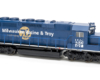 Dark blue six-axle road unit with white and gold graphics on white background