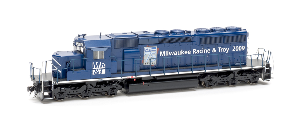 Dark blue six-axle road unit with Model Railroader anniversary graphics