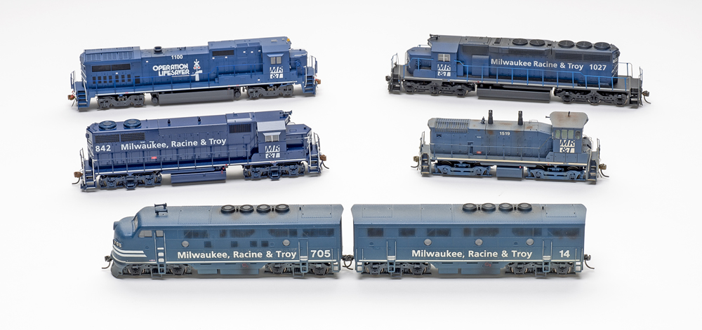 MR&T Jenks Blue locomotives: Photo of six HO scale diesel locomotives on white background