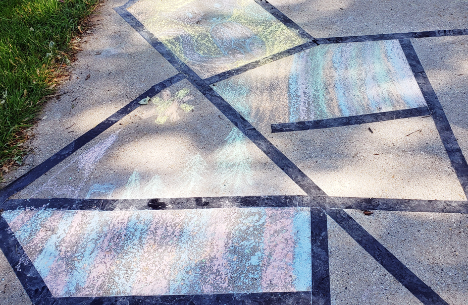 real chalk drawing on driveway