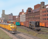 Four yellow diesels curve in front of a black switch engine in front of an industrial urban scene
