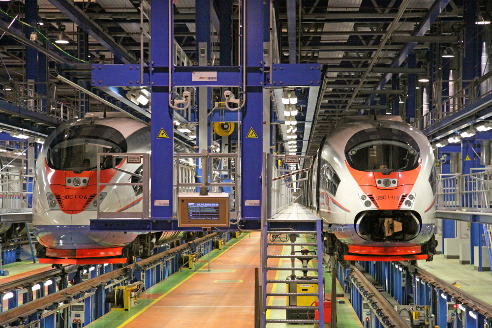 Two high-speed trainsets in shop building