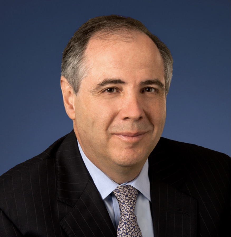 Man in pinstriped suit and tie