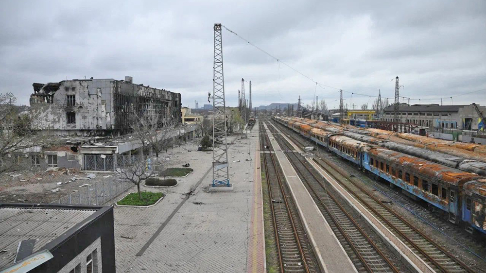 War-damaged building and railcars