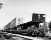 Rear of freight train carrying truck trailers