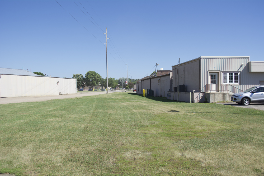 Buildings framing former railroad right-of-way