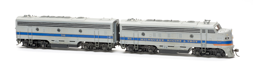 Photo of two HO scale cab units on white background.