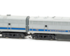 Photo of two HO scale Fairbanks-Morse passenger units on white background.