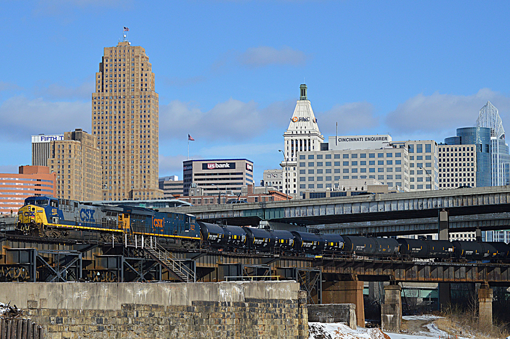 diesel train passing by city