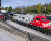 Several locomotives in a rail yard.