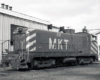 Black-and-white image of an end-cab switcher.