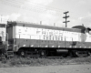 Black-and-white image of an end cab switching locomotive.