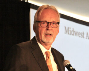 Man speaking at microphone