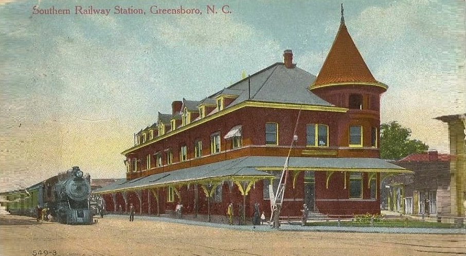 Vintage postcard of brick railroad station