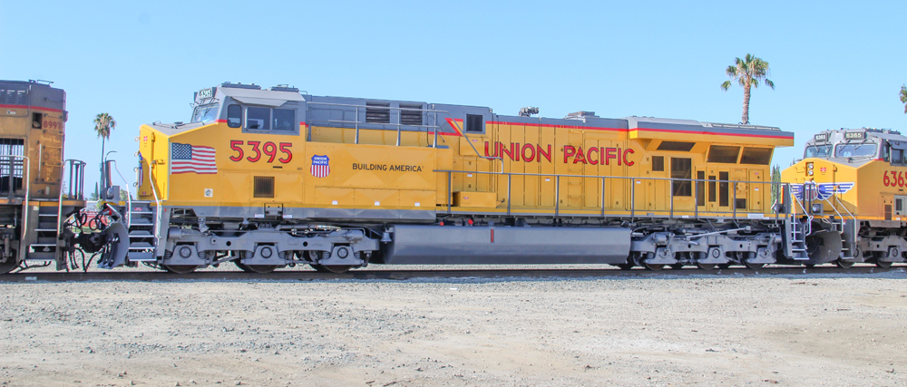 Yellow and gray locomotive with red "Union Pacific" lettering