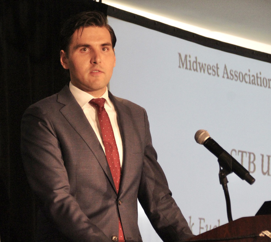 Man speaking at podium