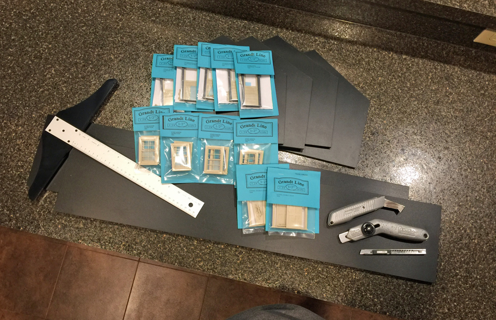 pieces of a model structure laid out for display