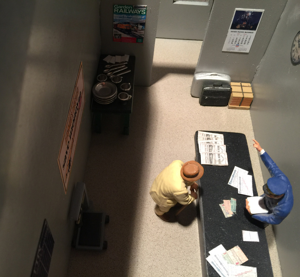 interior of a model depot with figures