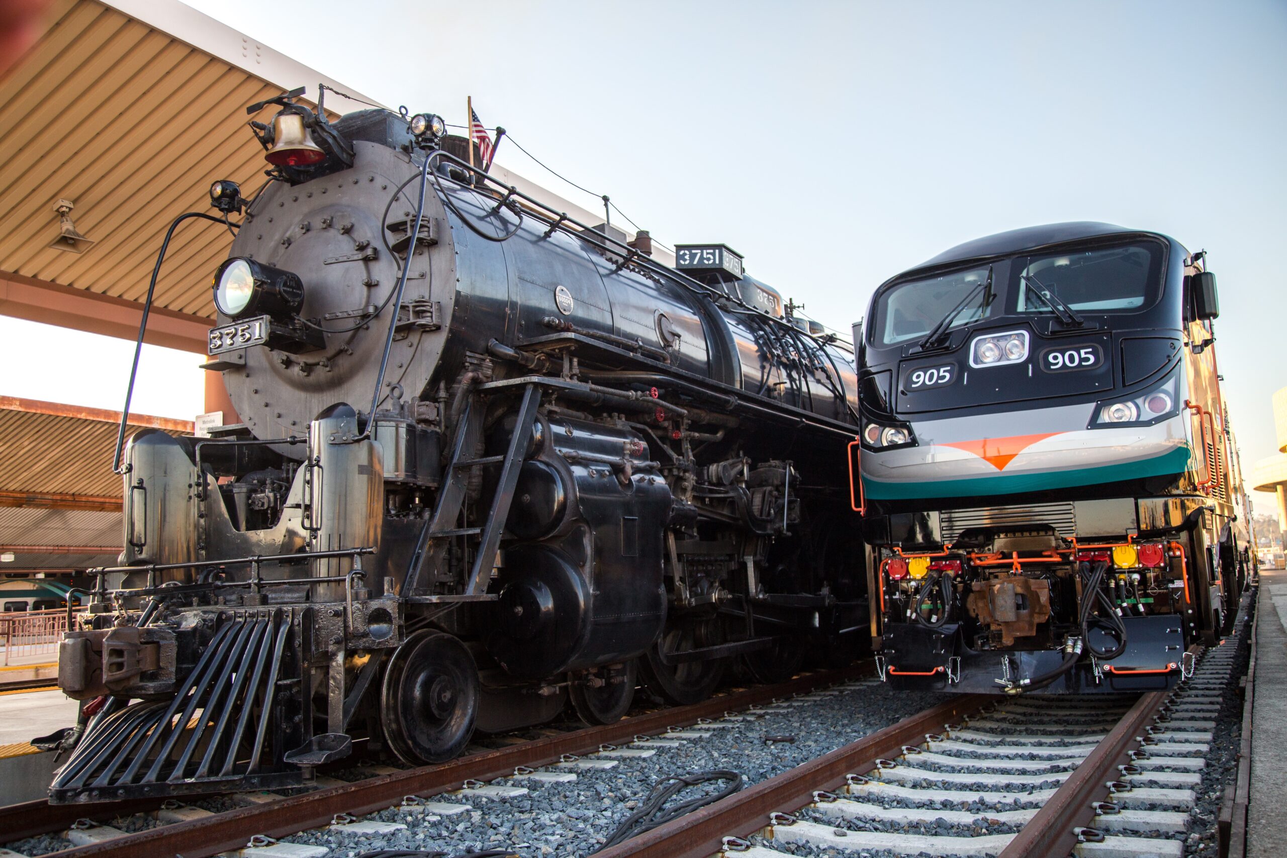 steam locomotive with modern diesel passenger locomotive