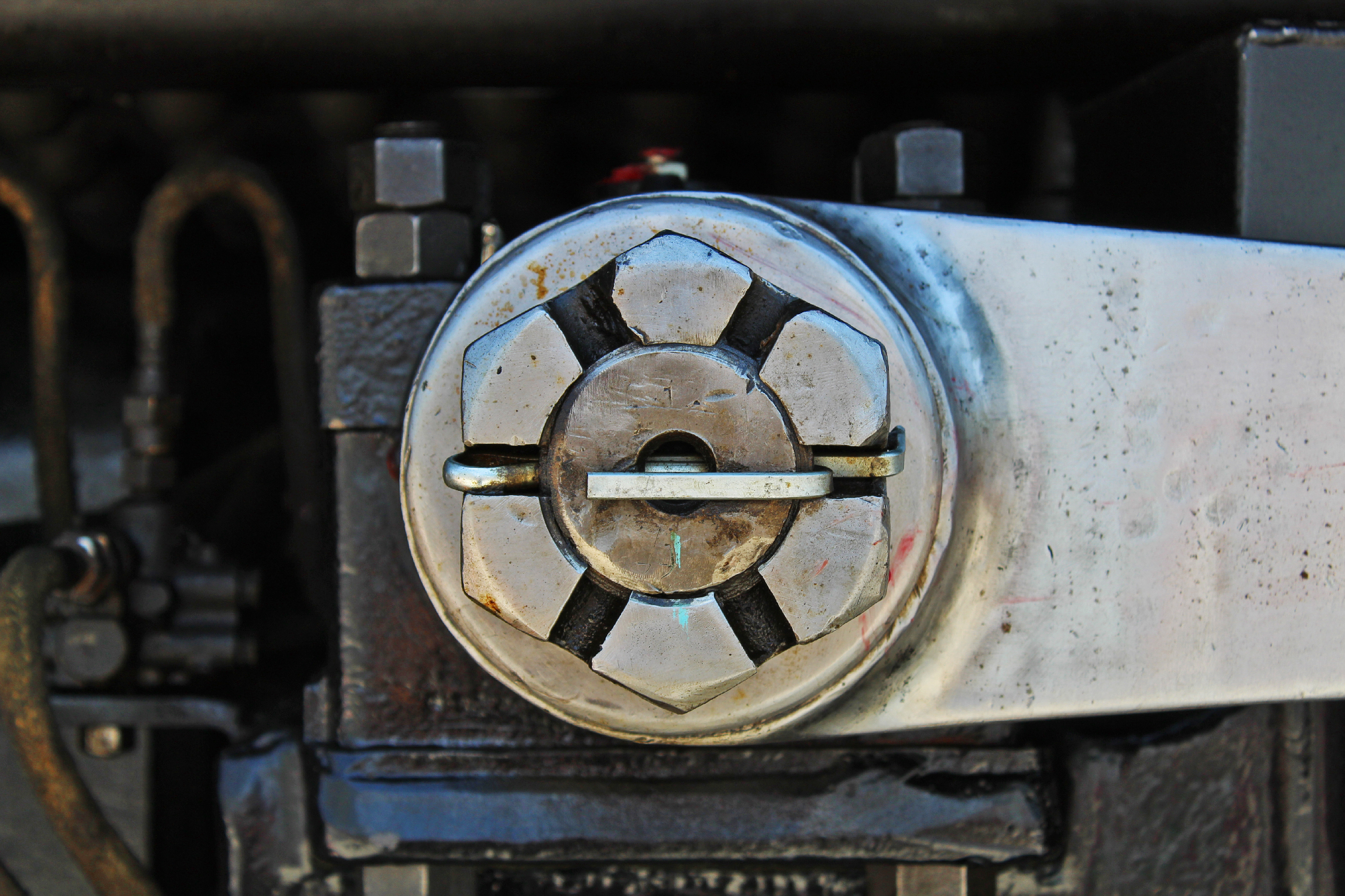 Close-up of a large nut holding together part of a Big Boy locomotive.