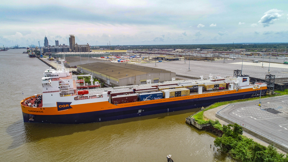 carferry in the sea with boxcars on it