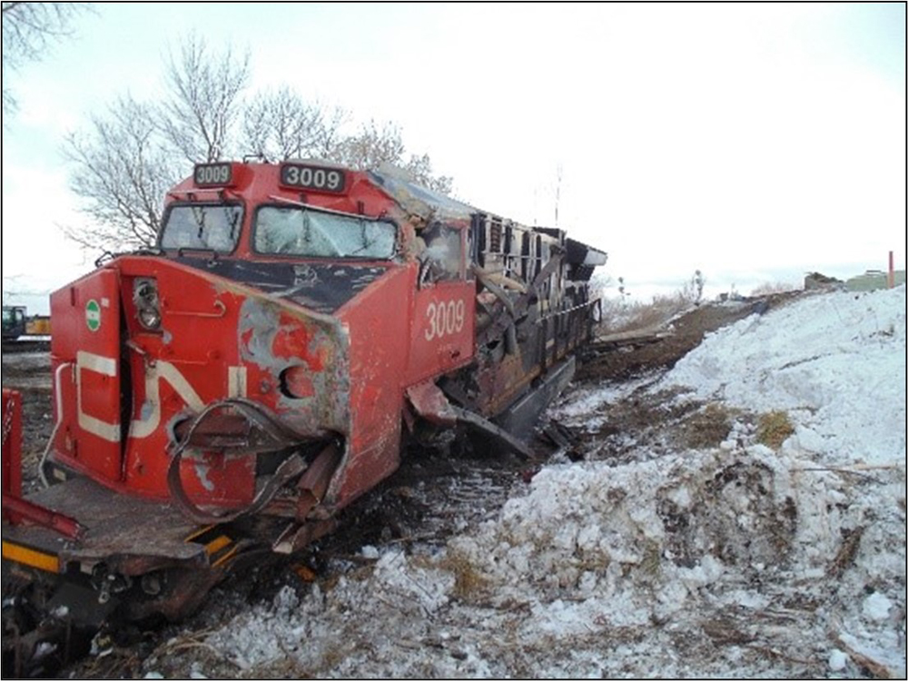 Canadian national locomotive with extensive damage on one side