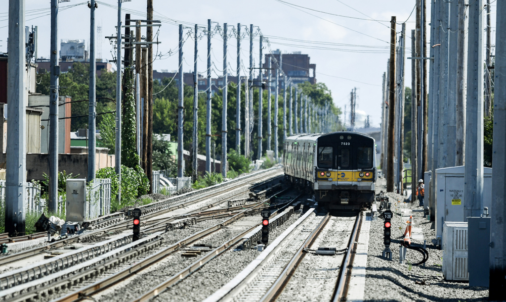 Electric multiple-unit passenger train on three-track main line