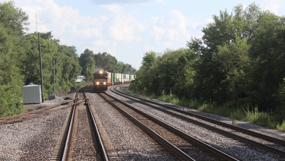 Freight train approaches, as seen from passenger train