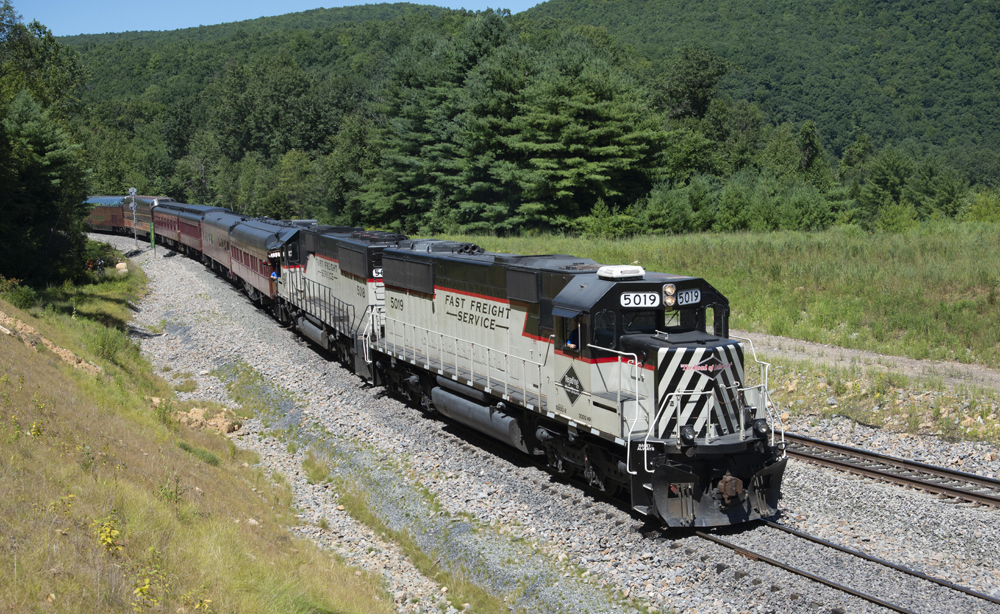 Diesel locomotives pulling passenger train