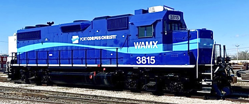 Blue locomotive with light blue curving stripe