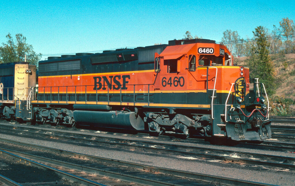 orange and gray painted locomotive