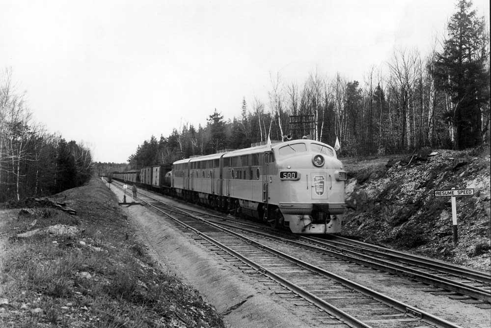 Streamlined Bangor & Aroostook Railroad diesel locomotive set on freight train
