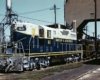 Blue and white diesel Bangor Aroostook locomotive at service area