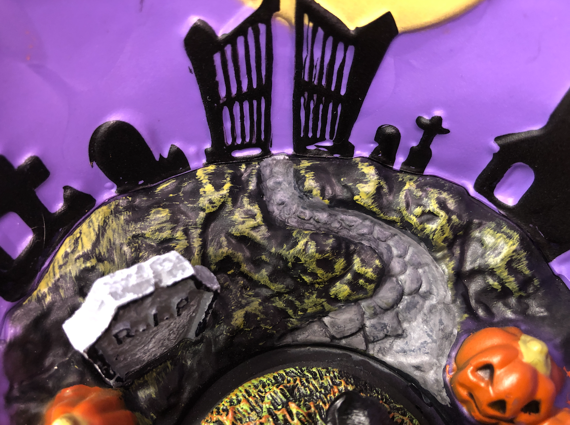 Halloween scene with gray road